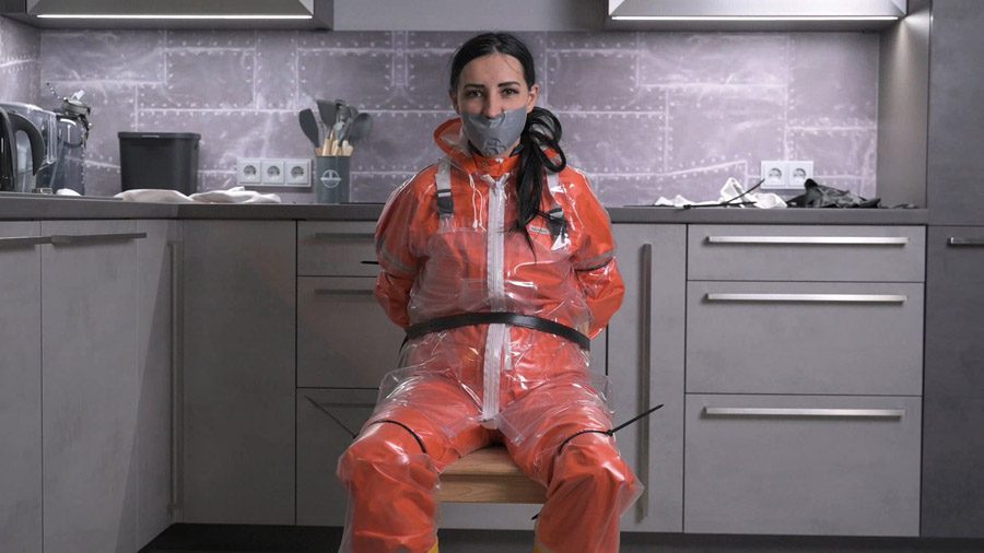 Amira in orange AGU rainwear and transparent bibpants and raincoat hard gagged part 2