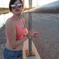 Violet Pixie is cuffed to a railing and left there