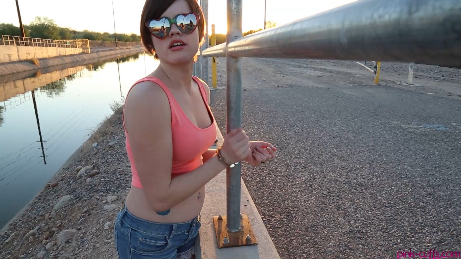 Violet Pixie is cuffed to a railing and left there