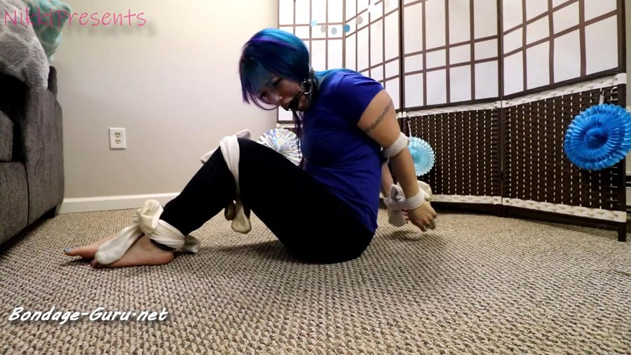 Nikki Presents Tied Up in Hooters Socks and Ball Gagged